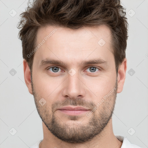 Neutral white young-adult male with short  brown hair and grey eyes