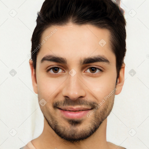 Joyful white young-adult male with short  black hair and brown eyes