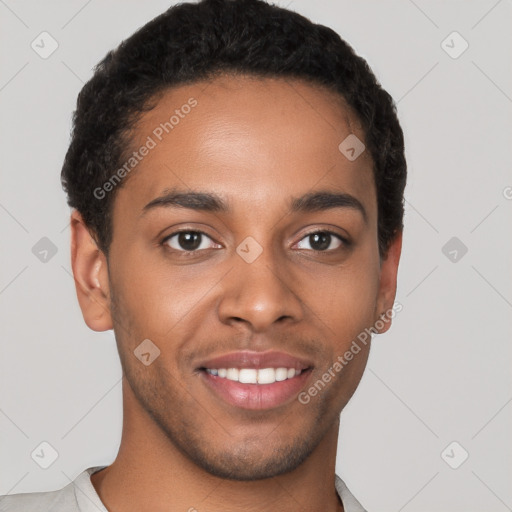 Joyful black young-adult male with short  brown hair and brown eyes