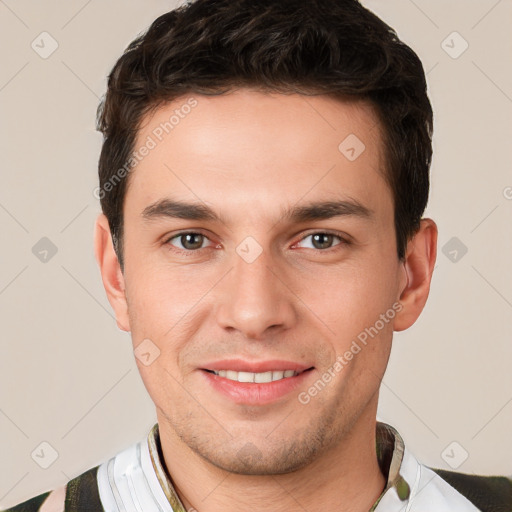 Joyful white young-adult male with short  brown hair and brown eyes