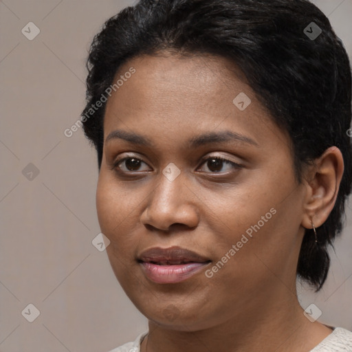 Joyful black young-adult female with medium  black hair and brown eyes