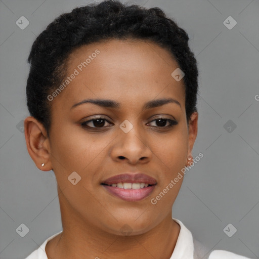 Joyful black young-adult female with short  brown hair and brown eyes