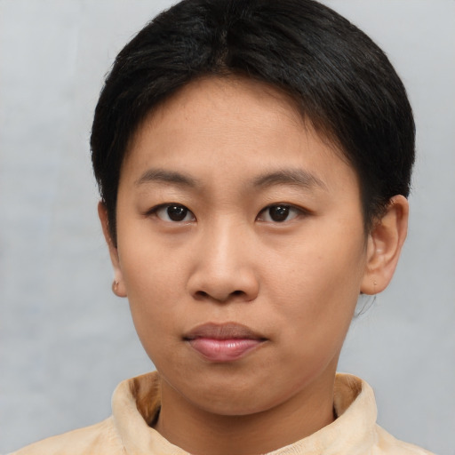 Neutral asian young-adult female with short  brown hair and brown eyes