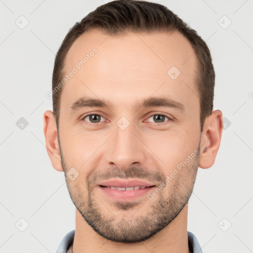 Joyful white young-adult male with short  brown hair and brown eyes