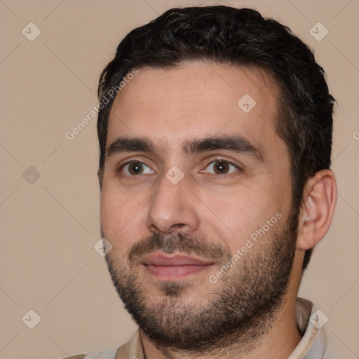 Joyful white young-adult male with short  black hair and brown eyes