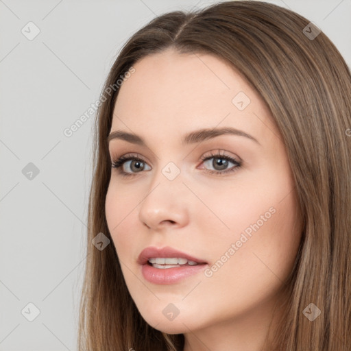 Neutral white young-adult female with long  brown hair and brown eyes