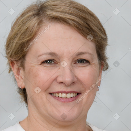 Joyful white adult female with medium  brown hair and grey eyes