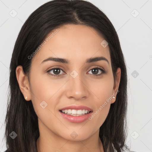 Joyful white young-adult female with long  brown hair and brown eyes