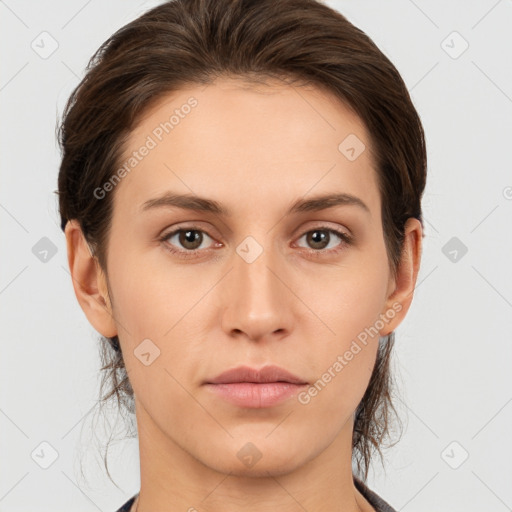 Neutral white young-adult female with medium  brown hair and brown eyes