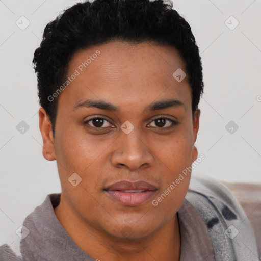 Joyful black young-adult female with short  black hair and brown eyes