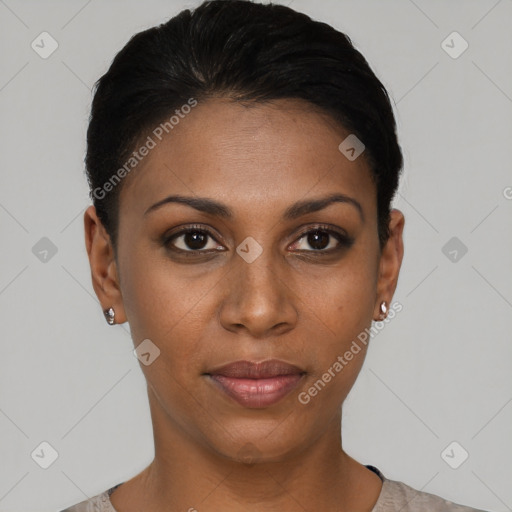 Joyful black young-adult female with short  black hair and brown eyes
