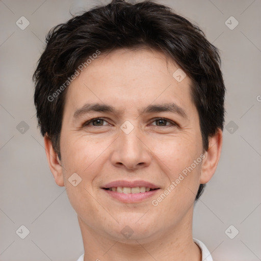 Joyful white adult male with short  brown hair and brown eyes