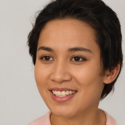 Joyful white young-adult female with medium  brown hair and brown eyes