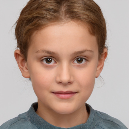 Joyful white child female with short  brown hair and brown eyes