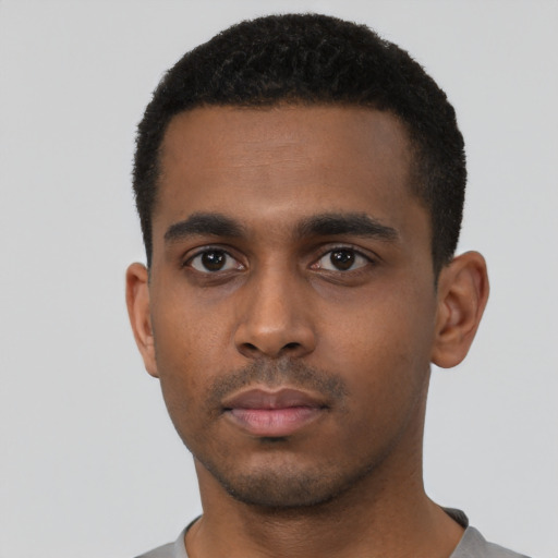 Neutral black young-adult male with short  black hair and brown eyes