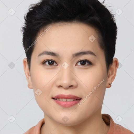 Joyful asian young-adult female with short  brown hair and brown eyes