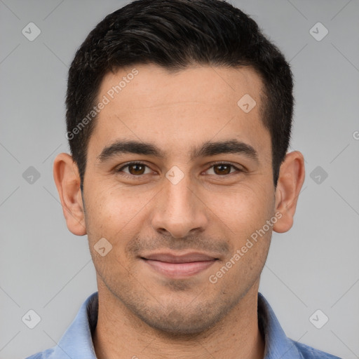 Joyful white young-adult male with short  brown hair and brown eyes