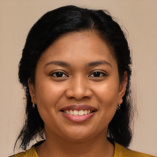 Joyful asian young-adult female with medium  black hair and brown eyes