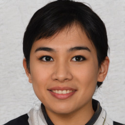 Joyful asian young-adult female with short  black hair and brown eyes