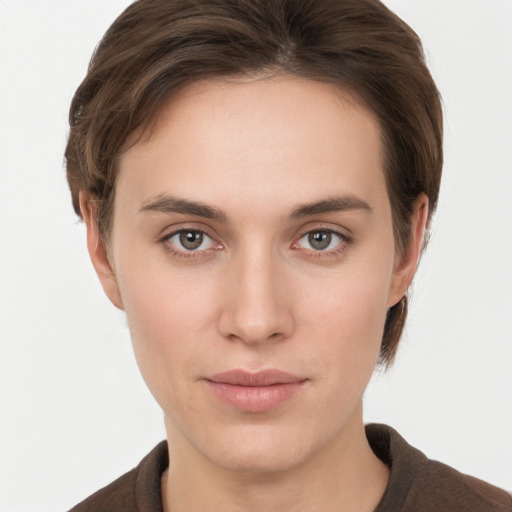 Neutral white young-adult female with short  brown hair and brown eyes