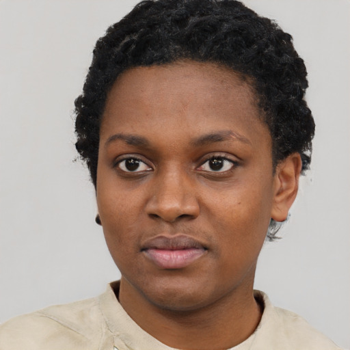 Neutral black young-adult female with short  black hair and brown eyes