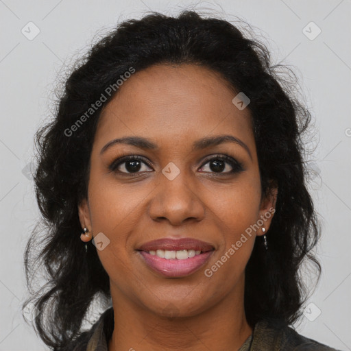 Joyful black young-adult female with long  brown hair and brown eyes