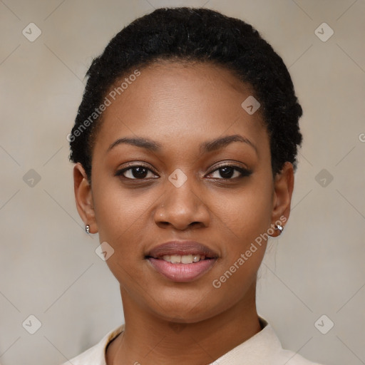 Joyful black young-adult female with short  black hair and brown eyes