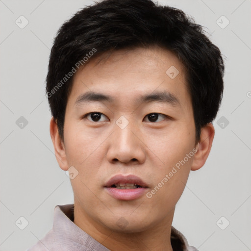 Neutral asian young-adult male with short  black hair and brown eyes