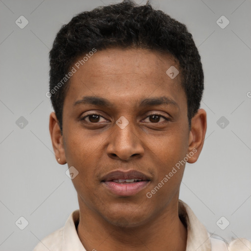 Joyful latino young-adult male with short  brown hair and brown eyes