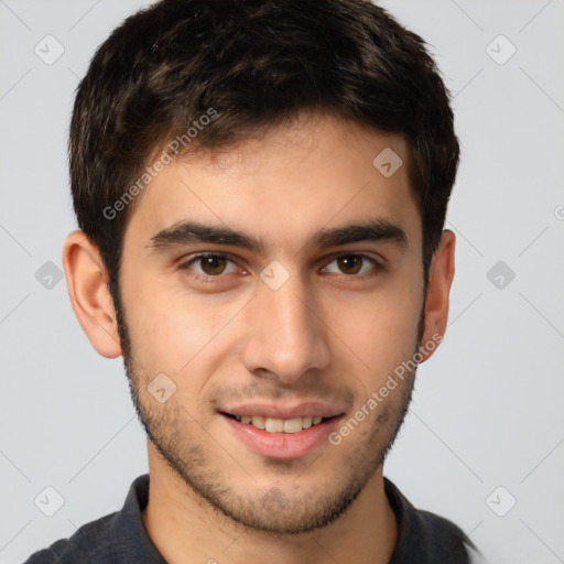 Joyful white young-adult male with short  brown hair and brown eyes