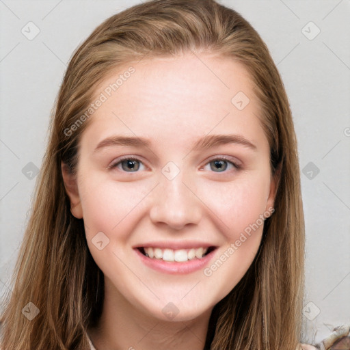 Joyful white young-adult female with long  brown hair and blue eyes