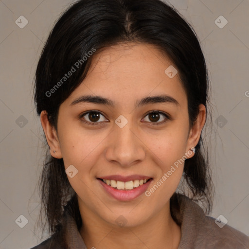 Joyful latino young-adult female with medium  brown hair and brown eyes