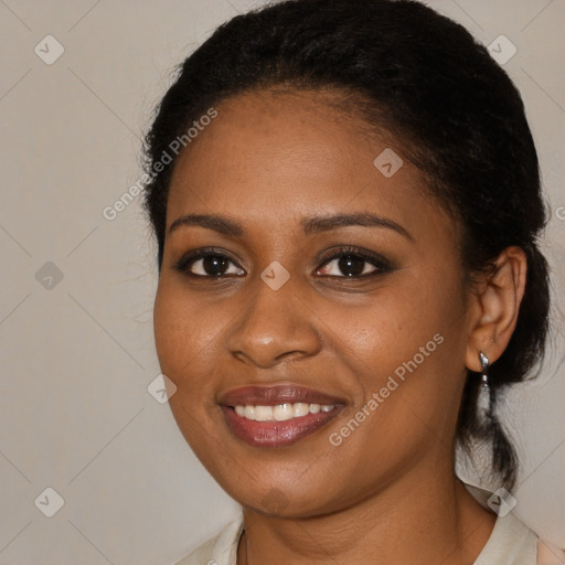 Joyful black young-adult female with medium  brown hair and brown eyes