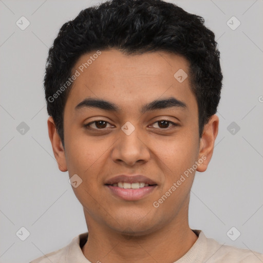 Joyful latino young-adult male with short  black hair and brown eyes