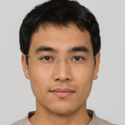 Neutral asian young-adult male with short  brown hair and brown eyes