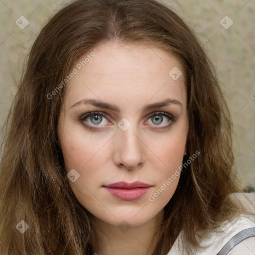 Joyful white young-adult female with long  brown hair and green eyes