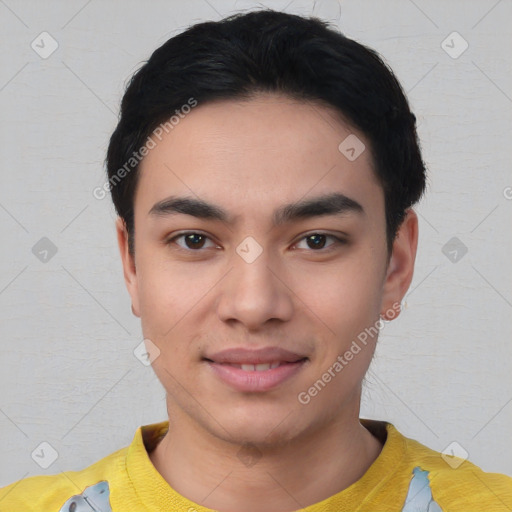 Joyful asian young-adult male with short  black hair and brown eyes