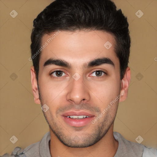 Joyful white young-adult male with short  brown hair and brown eyes