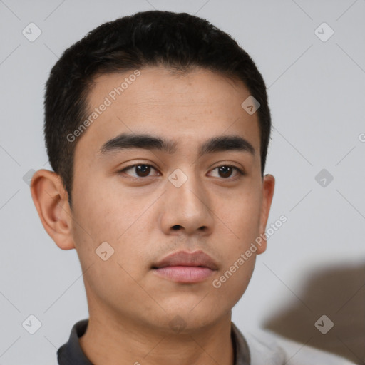 Neutral white young-adult male with short  black hair and brown eyes