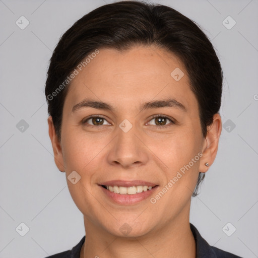 Joyful white young-adult female with short  brown hair and brown eyes