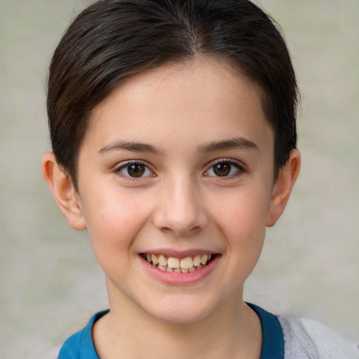 Joyful white child female with short  brown hair and brown eyes