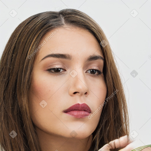 Neutral white young-adult female with long  brown hair and brown eyes