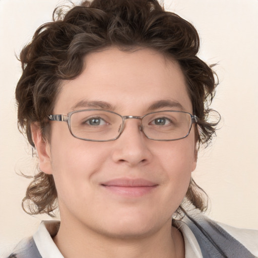 Joyful white young-adult male with medium  brown hair and brown eyes