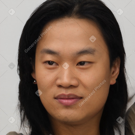 Joyful asian young-adult female with long  brown hair and brown eyes