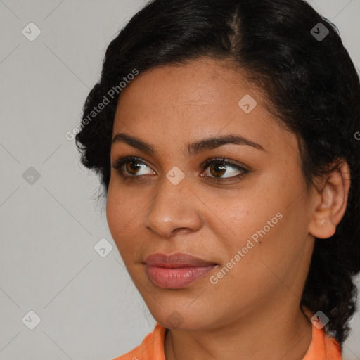 Joyful latino young-adult female with short  brown hair and brown eyes