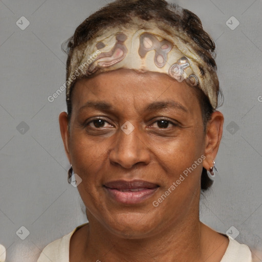 Joyful black adult female with short  brown hair and brown eyes