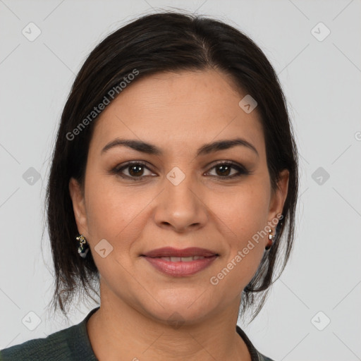 Joyful latino young-adult female with medium  brown hair and brown eyes