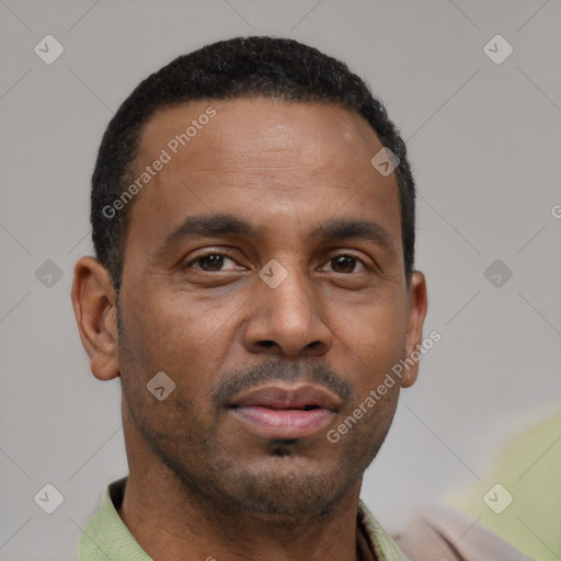 Neutral latino young-adult male with short  brown hair and brown eyes