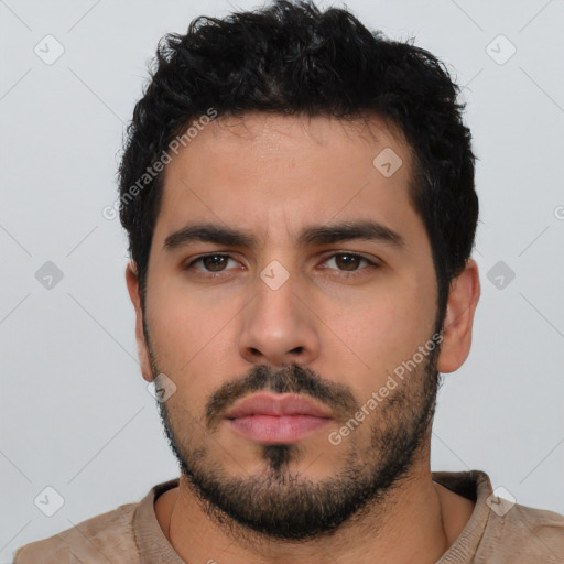 Neutral white young-adult male with short  black hair and brown eyes