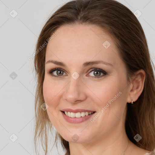 Joyful white young-adult female with medium  brown hair and grey eyes